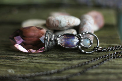 Pink crystal necklace with purple butterfly wing and moonstone