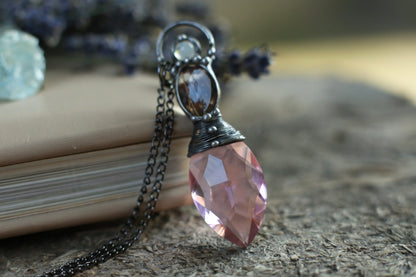 Pink crystal necklace with purple butterfly wing and moonstone