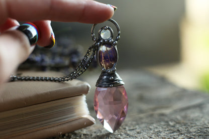 Pink crystal necklace with purple butterfly wing and moonstone