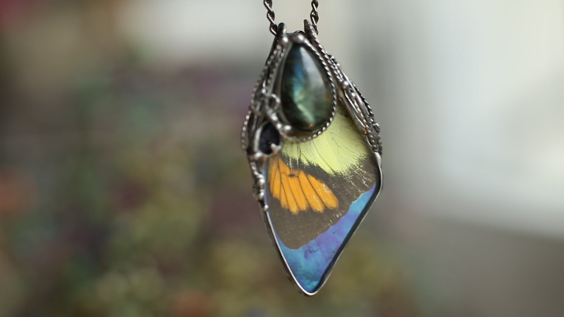 Preserved butterfly necklace with labradorite and sand stone